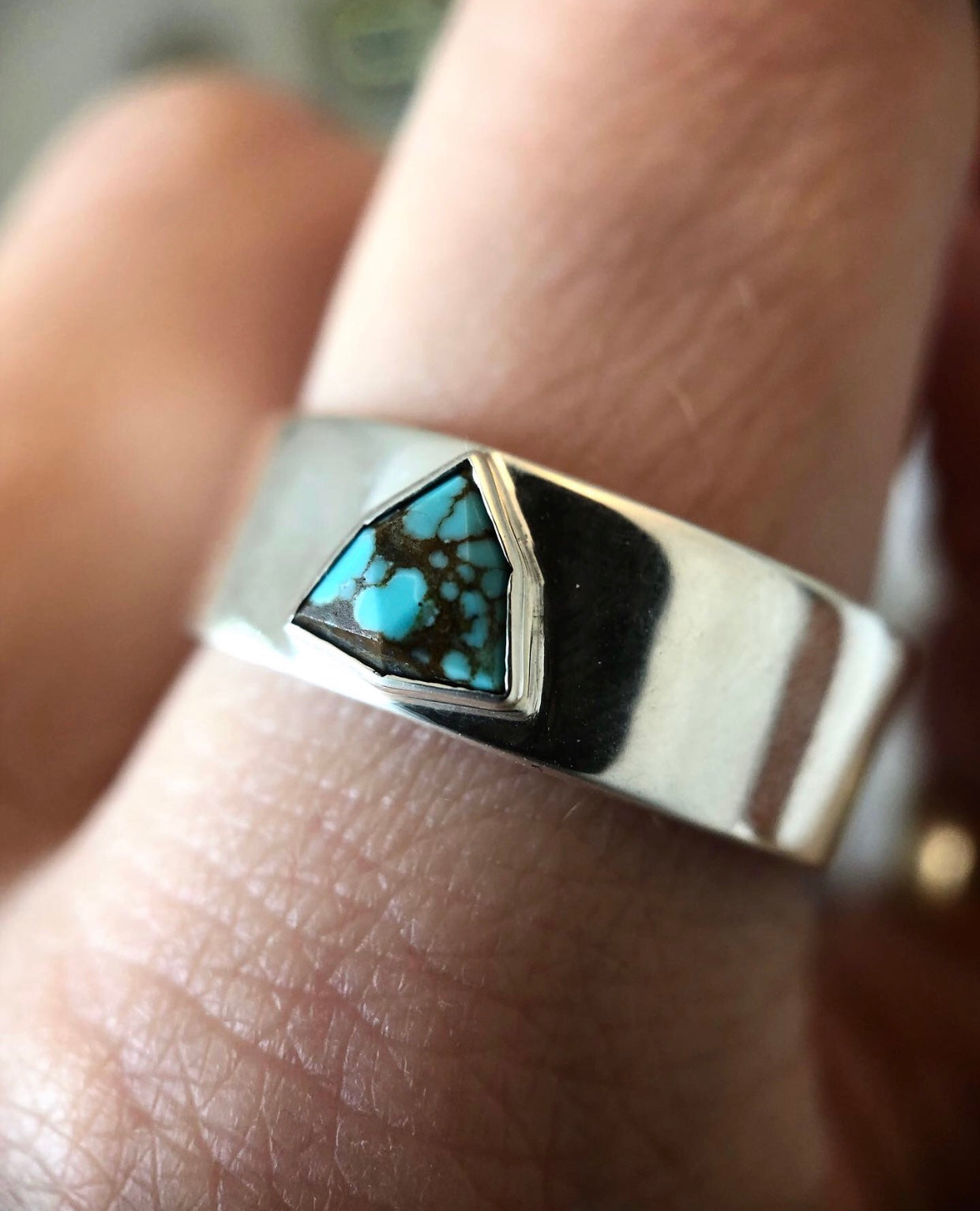 Wide Band Faceted Stone Ring On Hand